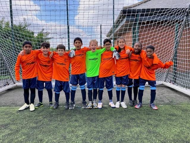 Our Year 3 & 4 children taking part in a football tournament at The Forest Sports Zone 